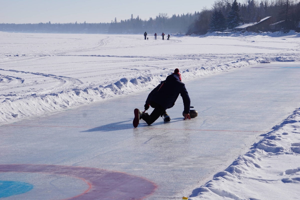 Grandview Curling Rink - Action on the curling ice created on Pigeon Lake. Shaela Dansereau/ Pipestone Flyer.